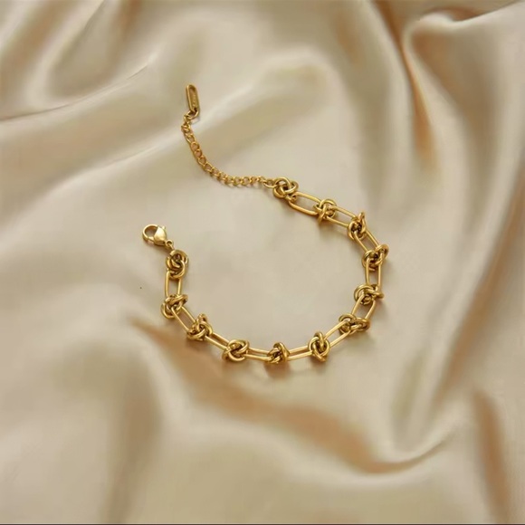 Anthropologie Jewelry - New 18K Gold Knot Link Bracelet plated Stainless Steel
